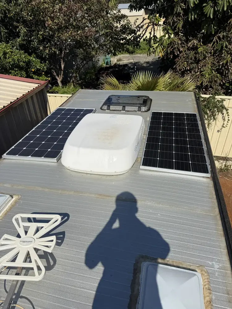 Same caravan roof after cleaning, solar panels and aircon unit, Perth