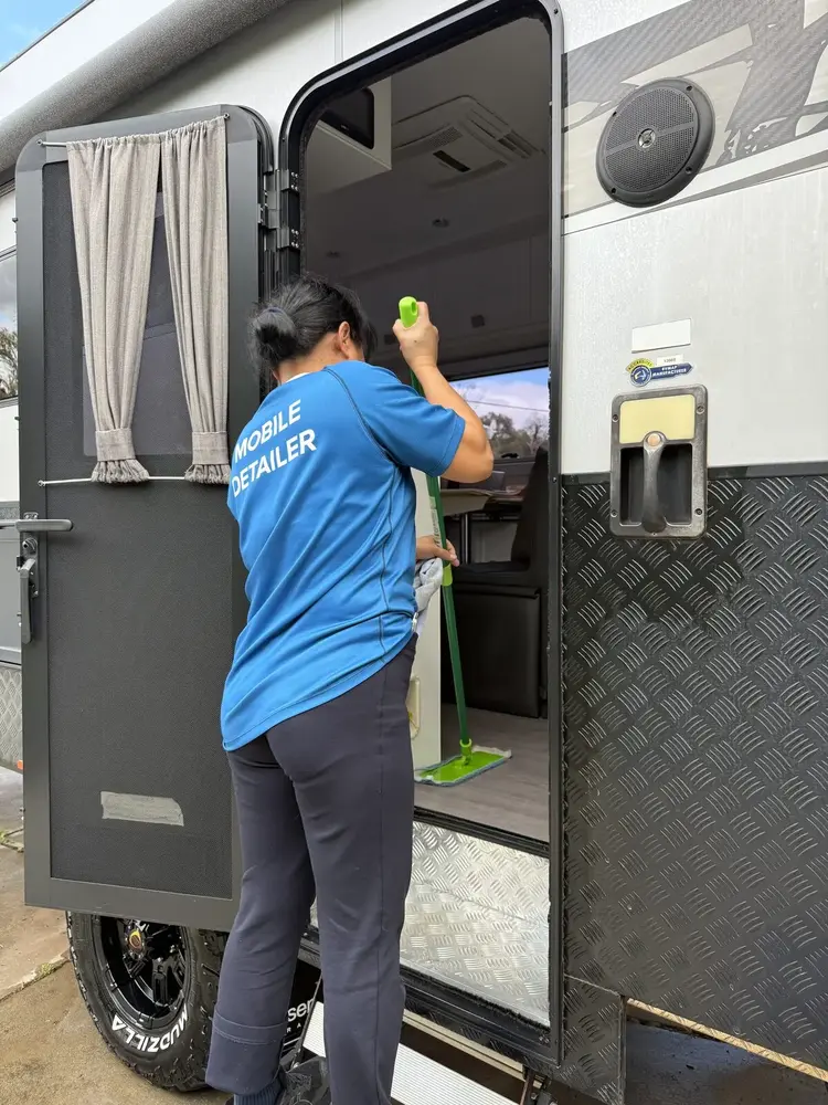 Mobile detailer cleaning caravan interior, Perth